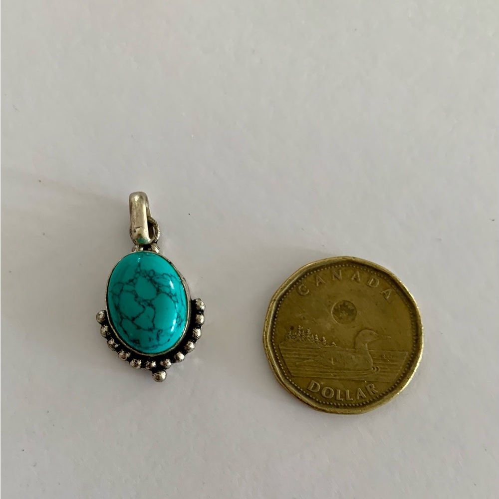 Turquoise Oval Pendant 9.25 Silver
